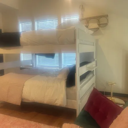 The Birdcage at The Hawk sleeps 10 - 2 bedrooms & 2 1/2 bathrooms.