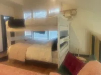 The Birdcage at The Hawk sleeps 10 - 2 bedrooms & 2 1/2 bathrooms.