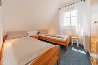 Lüttje Huck - Ferienwohnung 2 mit Seeblick & Sauna