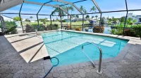 Love Bird–Canalfront villa lounge terrace heated pool pet friendly -  Casas de vacaciones