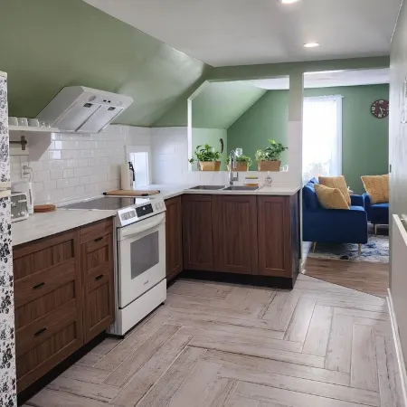 This is a private second-floor suite with its own entrance.