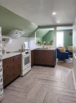This is a private second-floor suite with its own entrance.