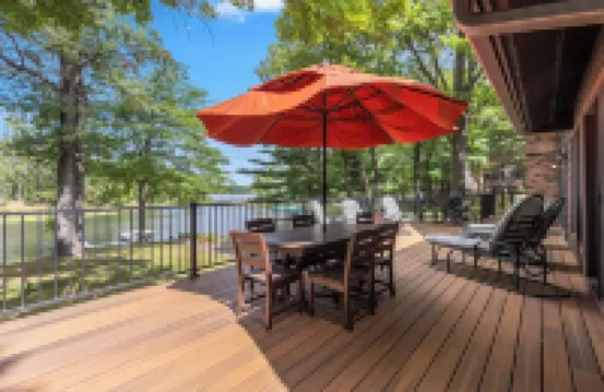 Whitefish Chain Lake Home with Beach + Sauna + King Beds + Kayaks +Paddle Boards