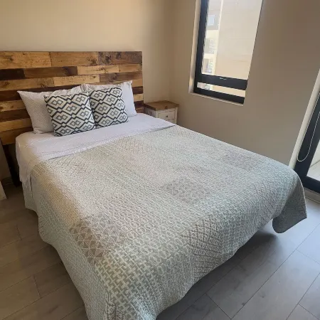 Oceana Suites Irarrazaval Отели рядом с достопримечательностью «Торговый центр Paseo Quilin»