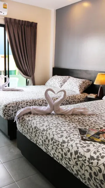 ห้องครอบครัวซูเปอริเออร์พร้อมระเบียงและวิวทะเลด้านข้าง