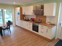 ~ Color magic red in Conneforde ~ with large terrace, garden, sauna,