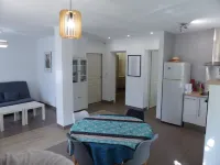 Large air-conditioned T2, private parking near the center and beach