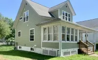 IN TOWN, ONLY 3 BLOCKS FROM LAKE MICHIGAN’S “STEARNS BEACH