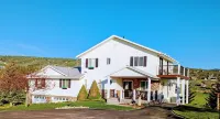 Golf Course Lakehouse with fantastic views of the lake, mountains & golf course.