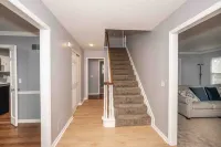 Large 5-bedroom house with WiFi and AC in welcoming neighborhood. Sleeps 12!