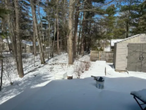 Cozy house in Indian River. Walking distance to Burt Lake and the public Beach.