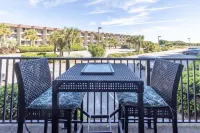 Peek of the ocean King size bed just Steps from the Beach