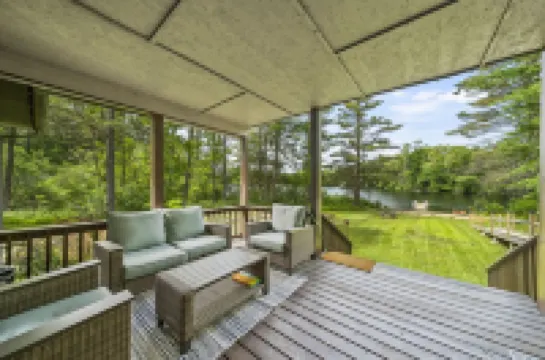 Quiet lake front home with private beach