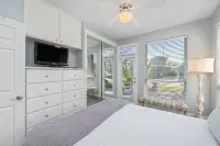 "Seaside Bliss: Waterfront Villa Just Steps from the Beach"
