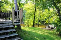 Lakeside cabin with Hot Tub and full kitchen!  Sleeps up to 12 people.