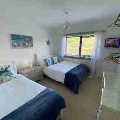Beautiful Beach house sleep13, 5 mins to beach&Hot Tub, games room, pets allowed Rooms