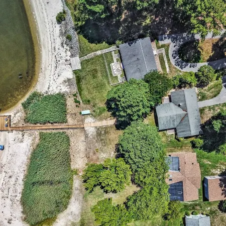 Quaint waterfront home with private beach