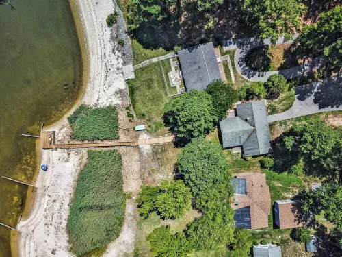 Quaint waterfront home with private beach