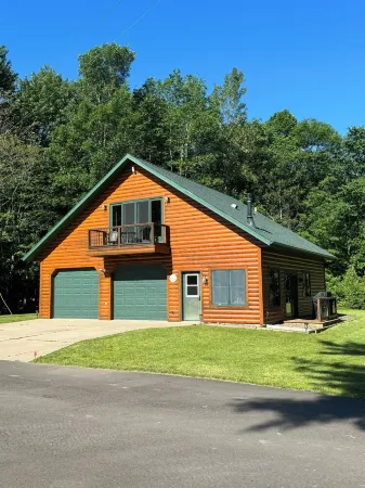 The lodge on Sand Lake. Your place to unwind and enjoy nature.