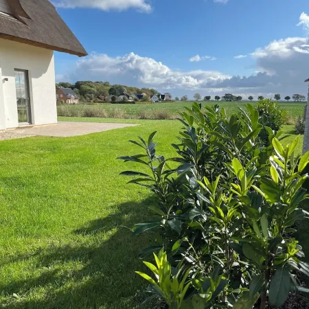 Dream thatched house with water view - 3 bedrooms - 10 min. walk to the beach
