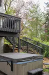 Charming Cottage with Hot Tub, Fire Pit, & Wooded Backyard