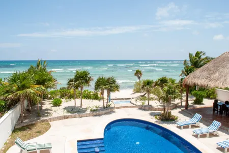 Tan Ik Beachfront Condos Отели рядом с достопримечательностью «Акумаль»