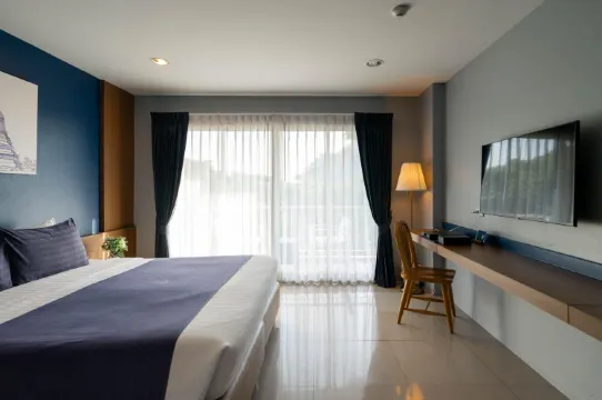 ห้องดีลักซ์ เตียงใหญ่ 1 เตียง