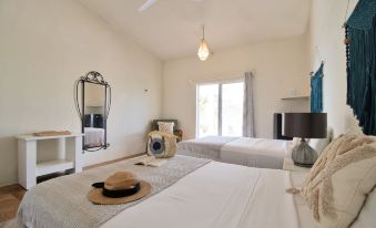Arena y Mar Beachfront House, El Cuyo by the Spot Rentals