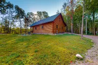 New dog-friendly cabin with river views, grill, modern interior, W/D, and AC
