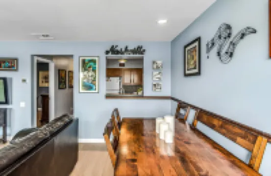 Private Patio Overlooking River with Pool and Gym - Charming Retreat