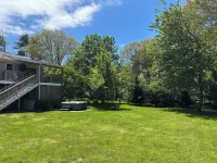Beloved 5-Bedroom House with Beach Passes, AC, Fenced in Yard, and Hot Tub Hotels near Lambert's Cove Beach