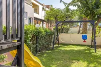 Theos Village Apartments