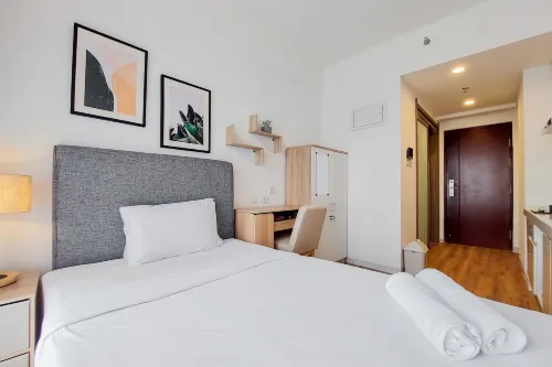 Warm and Simply Studio Apartment at Sky House BSD