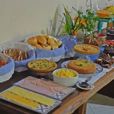 Pousada la Ferrugem Suites