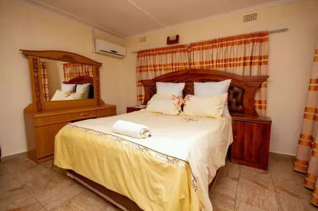 Mck Lodge Ltd Отели в г. Кафуэ