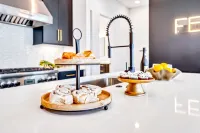 Luxury Stay With Rooftop Views in Prime Location