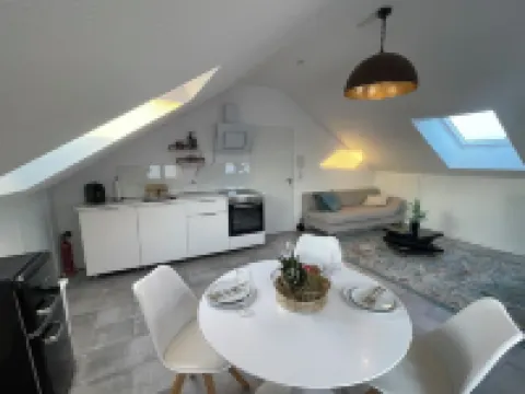 Bright, spacious attic apartment.