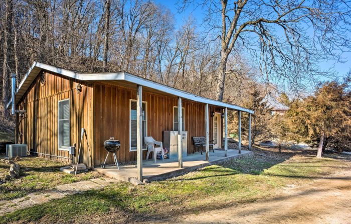 The Burgundy Cabin Iowa Retreat Pond and Fire Pit