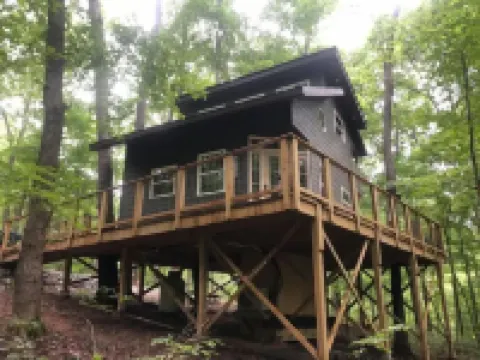 Secluded treehouse with indoor fireplace