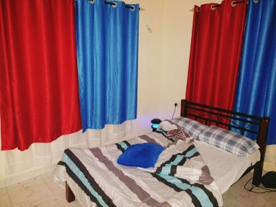 Peaceful wall fenced apartment with free parking and tight security