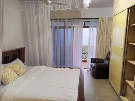 Beachfront Opulence: A Luxurious Three-Bedroom Haven with Breathtaking Sea Views