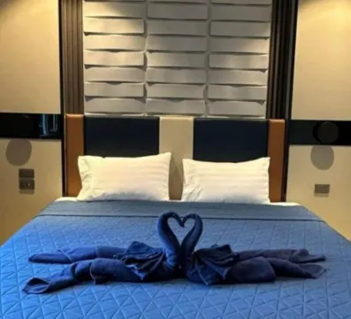 ห้องดีลักซ์ เตียงใหญ่ พร้อมวิวเมือง