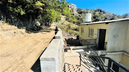 Shikhar Bunglow - A Stunning Valley View Bungalow in Mount Abu Отели рядом с достопримечательностью «Guru Sikhar»
