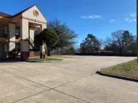 Quality Inn & Suites Hotels near County Line Holiness Church
