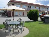 Swiss Sunset Inn Отели в г. Пентиктон
