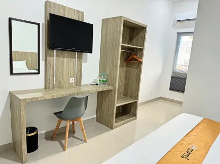 Toptel Hotel Отели в г. Labuh Baru Barat