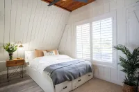 A pet friendly A-Frame with a hot tub & fire pit!