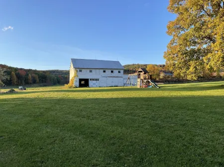 Spacious farmhouse on 3+ acres.  Pet and family friendly!