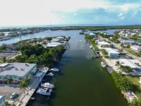 Turtles Nest. Amazing 2/2 with private ramp, boat slip, heated pool and more!