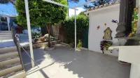 Casa con Jardín a 200m de la Playa. Ideal Para Toda la Familia. La Casa del Arco